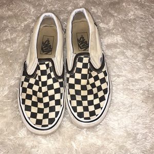 Checkered vans.